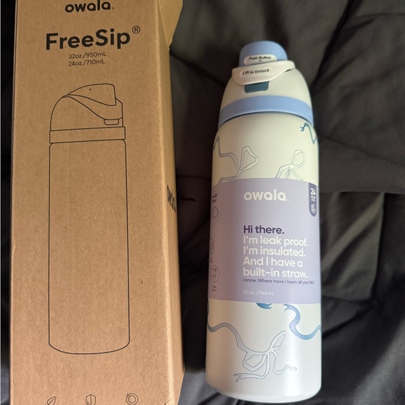 Owala blue bow FreeSip Insulated Water Bottle with Built-in Straw - Picture 1 of 5